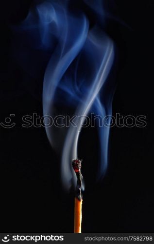 Macro Photo Of Burning Matches On Black Background