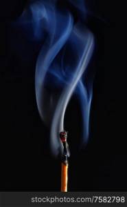 Macro Photo Of Burning Matches On Black Background