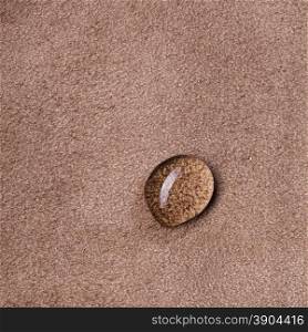 macro photo of water drop on brown leather background. macro photo of water drop on leather