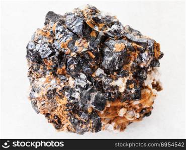 macro shooting of natural mineral rock specimen - piece of Sphalerite with Galena ore on white marble background from Far East region of Russia