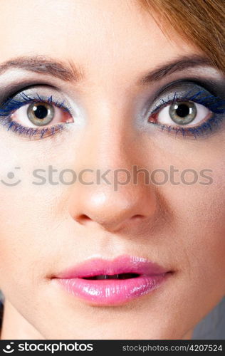 macro shot of a female face with fashion make-up