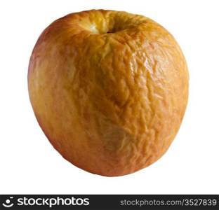Macro shot of an old wrinkled yellow apple against white background