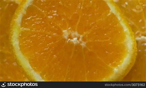 Macro shot of an orange fruit spinning