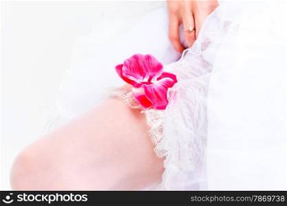 Macro shot of legs in stockings Bride