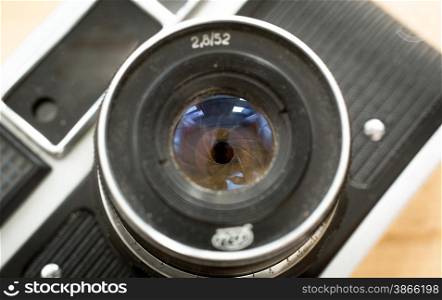 Macro shot of manual lens for retro camera with iris aperture