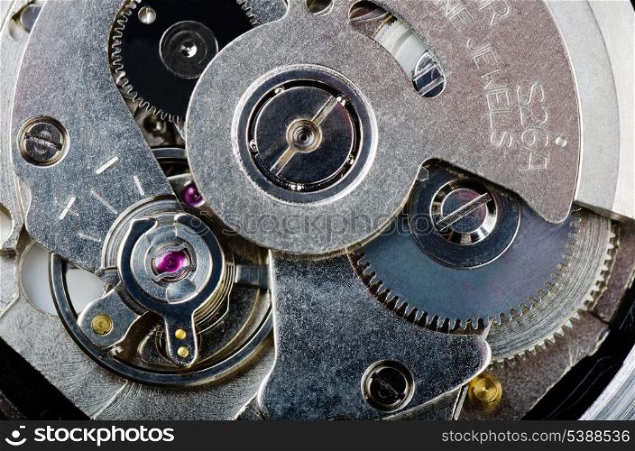 Macro shot of mechanism of wrist watch