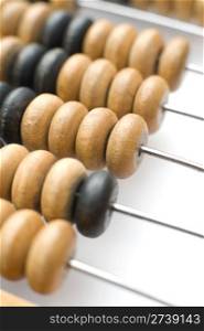 macro shot of old wooden abacus, shallow DOF