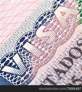 Macro shot of Schengen visa in passport