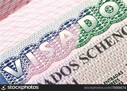 Macro shot of Spanish Schengen visa in passport