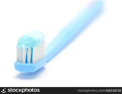 Macro shot of toothbrush on the white background.