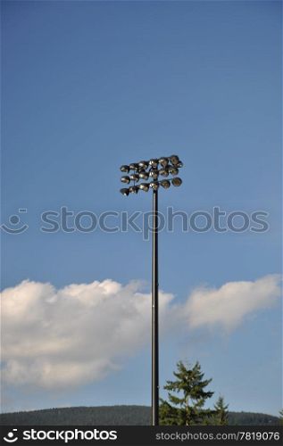 Macro stadium sport lamp with blue sky