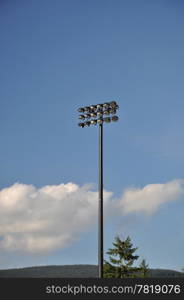 Macro stadium sport lamp with blue sky