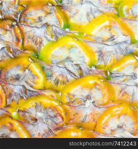 Macro texture of tropical fruit pineapple skin. Can be used as nature, food background