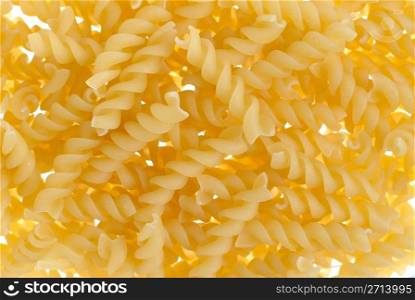 Macro up view of Pasta fusili background.