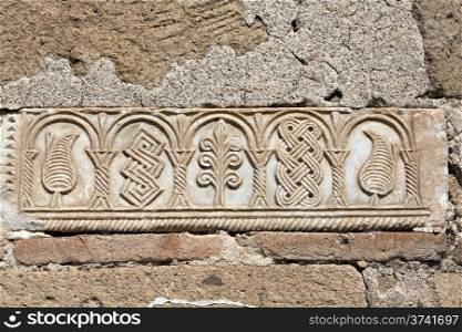 Macro view of relief patterns on wall of historic Seljukian cupolai, Eskisehir, Turkey