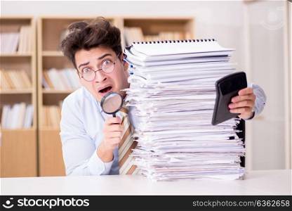 Mad auditor looking for errors in the report. The mad auditor looking for errors in the report