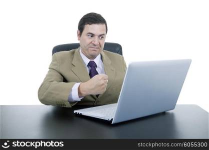 mad business man working with is laptop