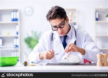 Mad crazy doctor preparing to eat rabbit
