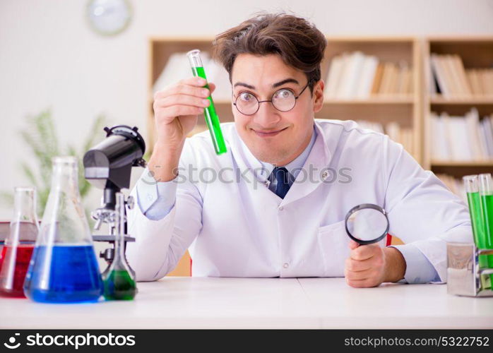 Mad crazy scientist doctor doing experiments in a laboratory