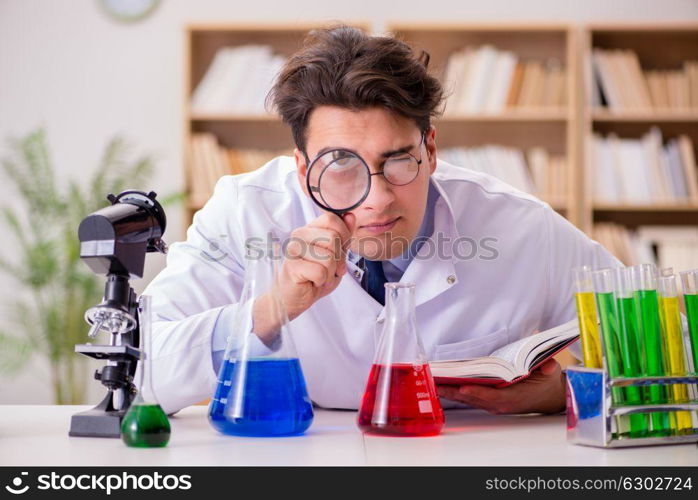 Mad crazy scientist doctor doing experiments in a laboratory