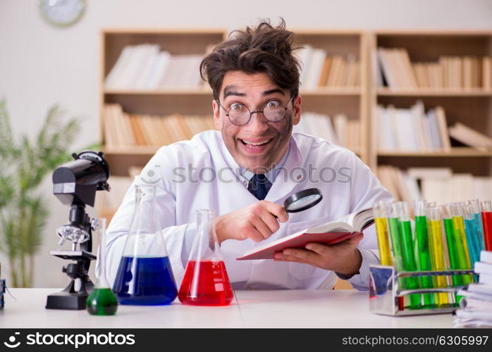 Mad crazy scientist doctor doing experiments in a laboratory