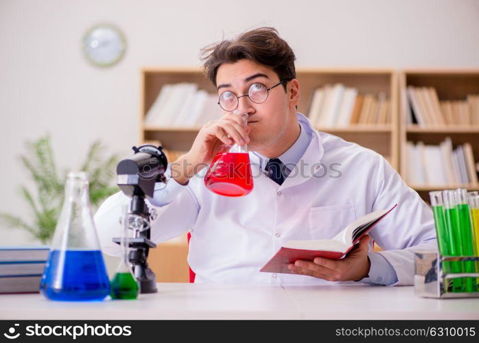 Mad crazy scientist doctor doing experiments in a laboratory