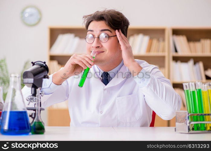 Mad crazy scientist doctor doing experiments in a laboratory