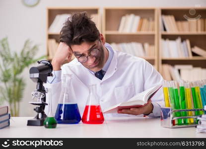 Mad crazy scientist doctor doing experiments in a laboratory