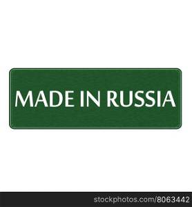 made in Russia white wording on Background green wood Board