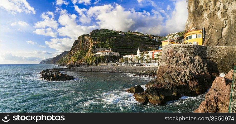 Madeira island vacation - picturesque village Ponta do Sol with impressive rocks, nice beach and colorful houses. Portugal