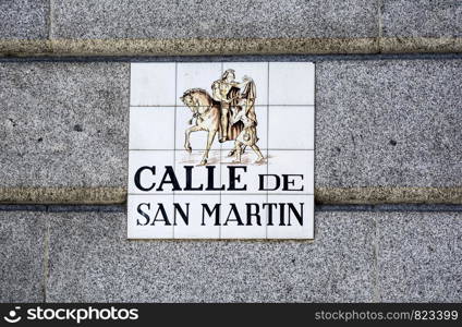 Madrid,Spain-September 13, 2017: Street Sign Calle de San Martin on a hause wall in Madrid, Spain