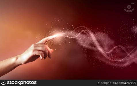 magical hands conceptual image. magical hand conceptual image with sparkles on colour background