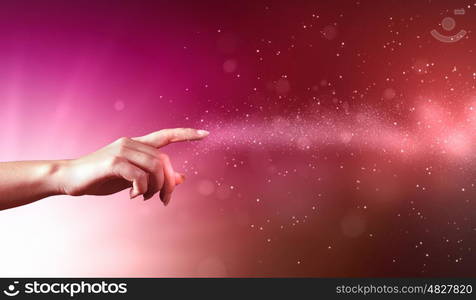 magical hands conceptual image. magical hand conceptual image with sparkles on colour background