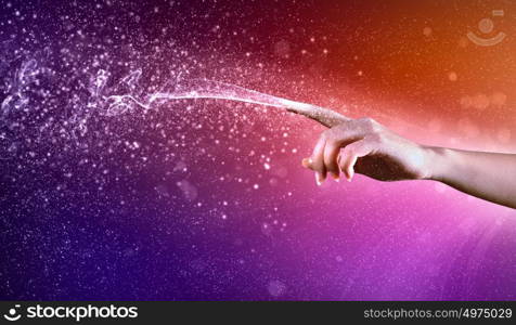 magical hands conceptual image. magical hand conceptual image with sparkles on colour background