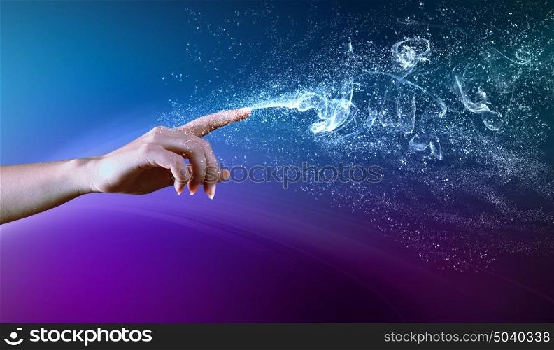 magical hands conceptual image. magical hand conceptual image with sparkles on colour background