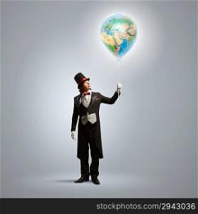 Magician with globe