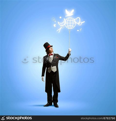 Magician with globe