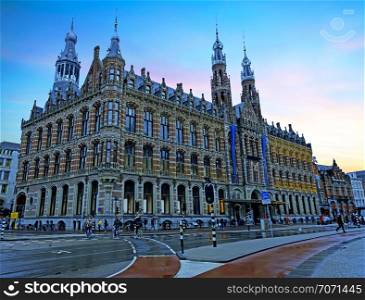 Magna Plaza in Amsterdam Netherlands at sunset