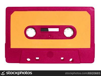 magnetic tape cassette isolated over white. pink magnetic tape cassette for analog audio music recording with yellow label isolated over white background