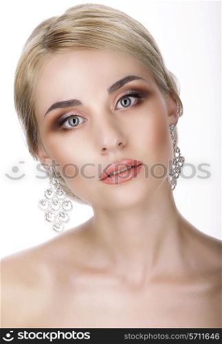 Magnetism. Portrait of Young Blond with Glossy Earrings