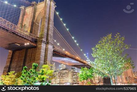 Magnificence of Brooklyn Bridge at night, New York City.