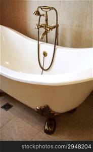 Magnificent bath with a beautiful bronze shower