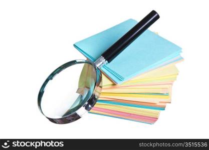 magnifying glass and a stack of paper isolated on a white background