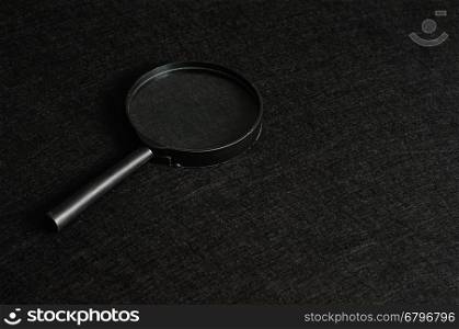 Magnifying glass isolated on a black background