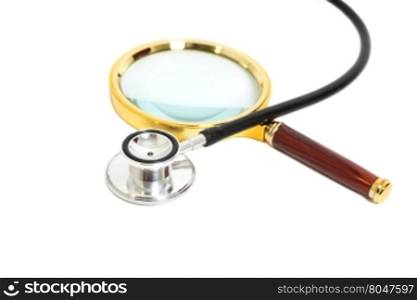 Magnifying Glass With Stethoscope isolated on white.Health concept