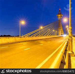 Maha Chesadabodindranusorn Bridge in Nonthaburi Thailand sunset