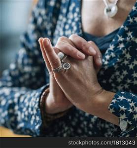 Mahamayuri Mudra. Hand gesture holding fingers in Mahamayuri Mudra for meditation, self-healing, opening of a crown chakra and increasing awareness.. Mahamayuri Mudra for Self-Healing, Opening of Crown Chakra or Sahasrara Chakra and Increasing Awareness