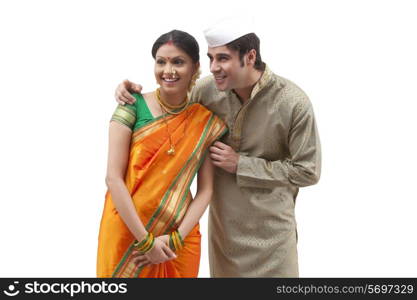 Maharashtrian couple looking at something