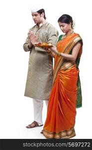 Maharashtrian couple praying