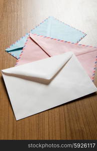 Mail concept with many envelopes on the table